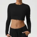 Black long sleeve crop top, slim fit yoga fitness shirt for women activewear variant. - Black