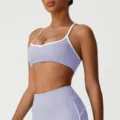 Lichtpaarse sport-bh en hoge taille leggings set met zeer stijlvolle witte randen. - S / Paars