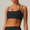 Soutien-gorge de sport noir à halter, élégant haut de yoga fitness rembourré. - XL / Noir Premium