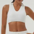 Top court de sport polo blanc pour femmes, gilet de fitness élégant pour le yoga et la course. - S / Blanc Cassé