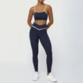 Navy blue color block yoga set with cross waist leggings and sports bra, variant style. - Navy Blue (Trousers Set)