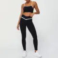 Black contrast trim sports bra and high waist crossover yoga legging set variant display - Black (Trousers Set)
