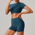 Teal athletic yoga set with crop top and high waist shorts, stretch workout fitness apparel. - S / Top And Bottom / Badge Blue