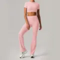 Pink yoga set featuring a crop top and high-waist flare leggings for women activewear. - M / Top And Bottom / Sakura Pink
