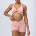 Set yoga con stampa leopardata rosa con reggiseno sportivo a nodo e pantaloncini fitness a vita alta - Taglia M / Sopra e Sotto / Rosa