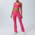 Pink two-piece yoga set featuring a halter crop top and high waist flare pants for women. - S / Pants Set / Peach Pink