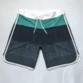 Vue de détail short de bain homme, tissu extensible séchage rapide à blocs de couleur. - Taille 28 / Bleu
