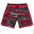 Close-up detail of the red and black abstract pattern, contrast piping, and adjustable drawstring. - Size 28 / 158# Red