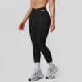 Zwarte yoga legging met stippen hoge taille kruis uitsnede fitness voor dames. - S (Aanbevolen 42.5-50kg) / Zwart