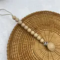 Silicone wooden pacifier chain baby teething clip detail view, safe material, durable and practical. - Khaki