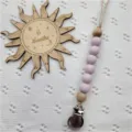 Catenella per ciuccio in silicone con perline di legno e clip, accessorio per neonati. - Viola a pois