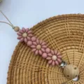 Silicone flower pacifier clip in dusty rose with natural wooden beads and secure metal clip. - Blush Pink