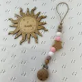 Cadena para chupete de bebé de silicona y cuentas de madera con estrella y clip. - Rosa y Blanco