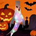 Illuminated Halloween ghost windsock hanging decoration with colorful LED lights - Tongue-out glowing hair dryer ghost