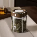 Clear glass storage jar with brown lid 850ml food container for tea coffee kitchen organization - 850ml