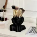 Creative Face Makeup Brush Holder Black Resin Desk Organizer with Golden Brushes SKU - Black