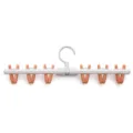 Opvouwbare kunststof kledinghanger met meerdere clips voor sokken en kleine kleding. - Zakverpakking / Oranje