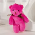 Close-up of bright pink teddy bear plush keychain with ribbon - 12cm / Rose Red