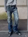 Men's street style washed blue stacked flare denim jeans featuring button fly and pleats. - S / Blue