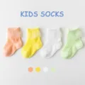 Schattige kinder sokken van mesh met kanten afwerking in vier mooie pastelkleuren voor de zomer. - 0-1 Jaar / B230 Groep B - geel oranje groen wit