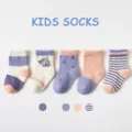 Cute cotton kids socks featuring adorable elephant patterns and colorful stripes. - Taro Purple Elephant