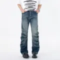 Men distressed blue stacked flare jeans featuring multi-button fly and stacked legs. - S / Blue