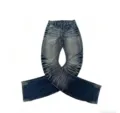 Close-up detail of vintage washed blue flared jeans with unique whiskered denim texture. - S / Blue