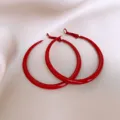 Red hoop earrings detailed shot, minimalist design, glossy finish, elegant fashion jewelry. - Large Hoop Style / 5cm Diameter / Red