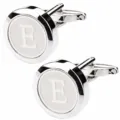 Close-up detail of silver-toned metal round French shirt cufflinks featuring letter E design. - Letter E
