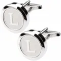 Detailed view of silver metal round French shirt cufflink engraved with letter L clearly. - L