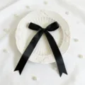 Fiocco in nastro di raso nero per confezione regalo e decorazione, accessorio fai da te elegante. - Nero
