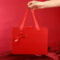Red gift box with ribbon handle and bow, small pull-out packaging box for cosmetics. - Large Size 27*20*8.8cm / Red Pull Bow with Gold Edge