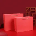 Thickened red paper gift bags for wedding party favors, festive portable packaging bags. - Solid Color Gift Bags / 35x28.5x13cm