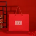 Red paper gift bag for wedding favors, thick handheld packaging bag with festive design. - True Love Gift Bag