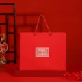 Red paper gift bag with Chinese wedding character, thick festive packaging for souvenirs. - Wedding Gift Bags