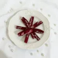 Burgundy ribbon bow with golden text, ideal for gift box packaging and decoration details. - Round Finished / About 10x10cm / Burgundy