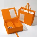 Premium orange gift box set with clear window, elegant flip-top design and matching gift bag. - 25x19.5x8cm / Orange