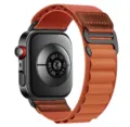 Detail view of the orange nylon loop watch strap with leather patch and secure metal buckle. - Universal Smartwatch Series / Terracotta (Black Buckle)