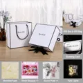 Minimalist black and white gift box set with bag, greeting card, and cute accessories. - Small Gift Box, Gift Bag, Raffia, Card, Bouquet, String Lights and Rabbit