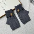 Cozy thick knit fingerless gloves in dark grey with stylish brown leather patch details. - One Size / Dark Gray