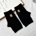 Winter warm black knit fingerless gloves for women, thick wool half finger gloves for cold days. - One Size / Black