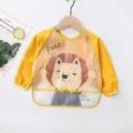 Waterproof long-sleeve baby bib with cute cartoon lion print, perfect for toddler feeding. - Size M, 24-36 Months / Yellow Lion