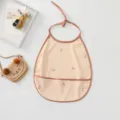 Baby waterproof feeding bib detail shot, cute floral pattern with practical pocket. - Pink Small Flowers Bib