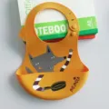 Silicone baby bib waterproof soft feeding bib for infant children with cute cartoon print. - Yellow Fox