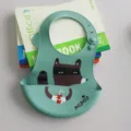 Waterproof silicone baby bib with cute raccoon cartoon pattern, soft and easy to clean. - Blue Fox