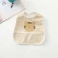 Waterproof baby bib with cute cartoon tiger design and catcher pocket, ideal for mealtime. - Tiger Head