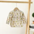Baby waterproof long-sleeve smock bib, cute cartoon print feeding apron for infants. - Size S (6-12 Months) / PU Bib with Top Pocket - Beige Smiley Face