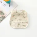 Close-up view showing the cute olive print pattern, waterproof fabric and pocket design of baby bib. - Green Olive Branch