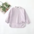 Detailed view of baby waterproof long sleeve bib with cute cat ears and front pocket. - S (6-12M) / Light Purple Cat
