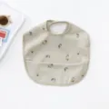Waterproof baby PU bib with cute floral print and crumb catcher pocket for easy feeding time. - Yellow Little Daisy